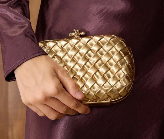 Golden woven clutch