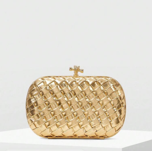 Golden woven clutch