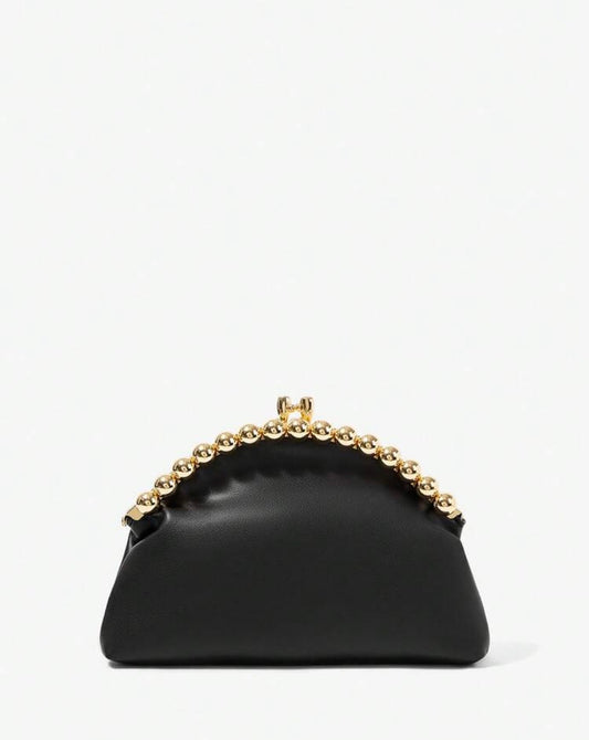 A black leather handbag with a gold-tone chain handle, photographed against a plain white background.