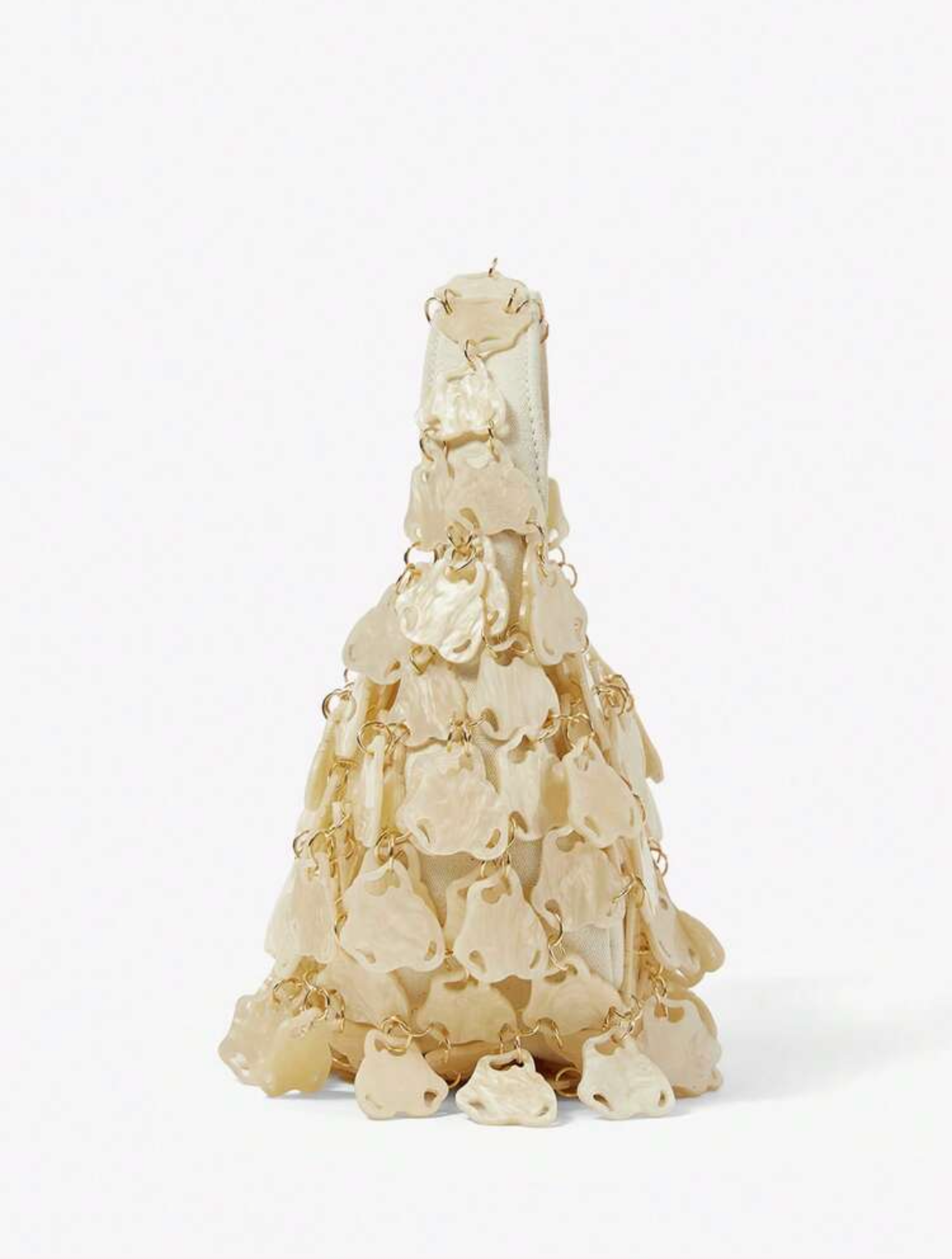 Decorative item resembling a Christmas tree made of layered beige material on a white background.