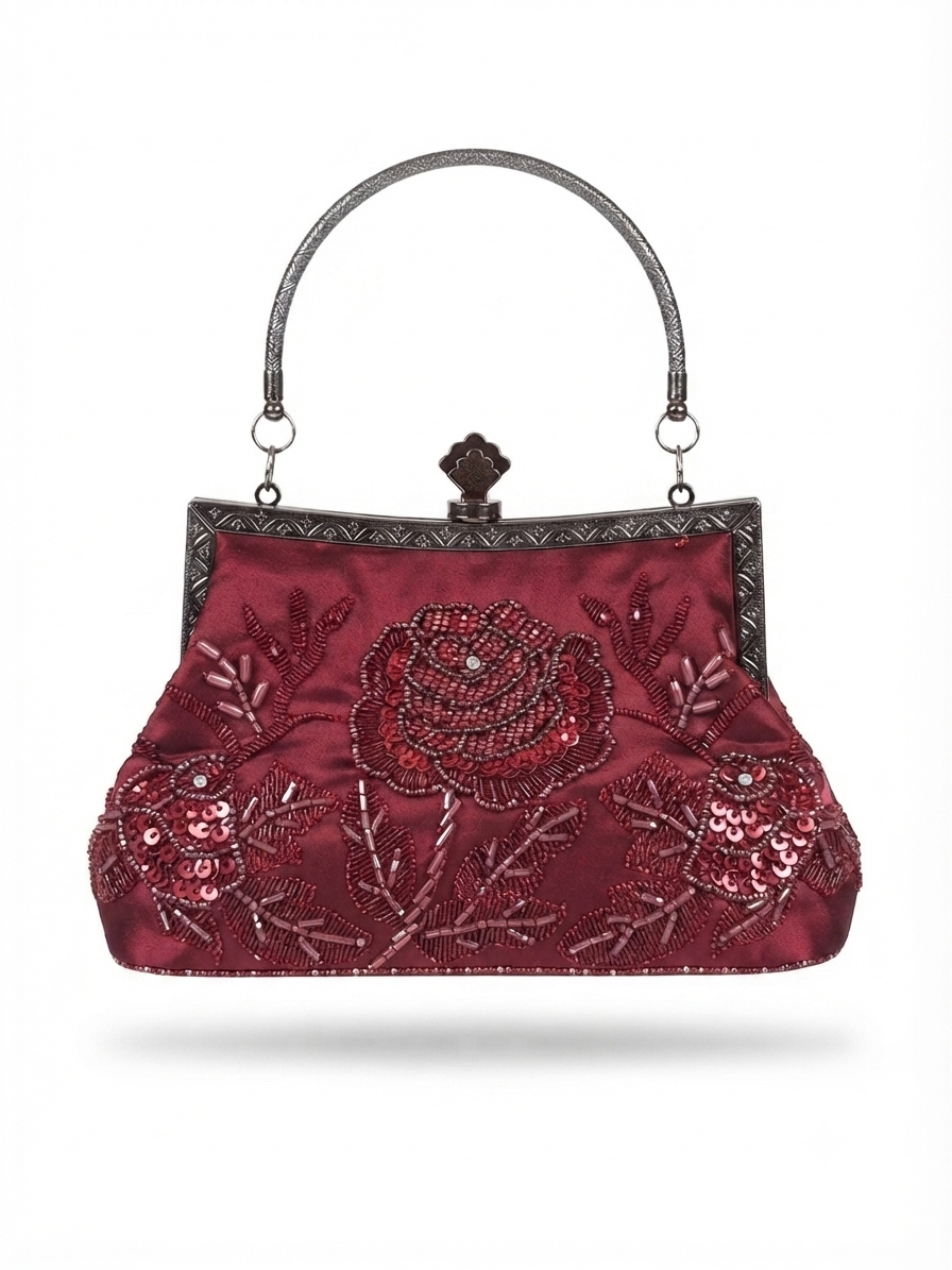 A burgundy satin evening clutch bag with intricate floral sequin and bead embroidery, featuring a silver-tone metal handle and frame closure.
